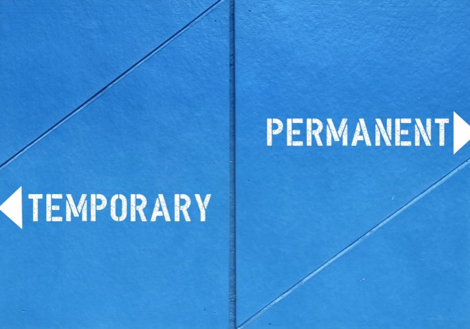 Blue wall with differnt direction sign point to PERMANENT (no end date which employee receives benefits package) or TEMPORARY (duration of employment with contract end date) employment